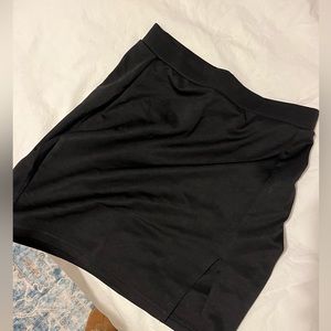 Black mini skirt with slit